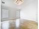 Bright bedroom features neutral walls, tile floors, and two windows providing natural light at 786 Seneca Meadows Rd, Winter Springs, FL 32708