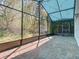 Large screened-in lanai offers outdoor living space at 786 Seneca Meadows Rd, Winter Springs, FL 32708