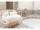 Well-appointed bathroom featuring a granite countertop and toiletries in a welcoming display at 9036 Stinger E Dr, Davenport, FL 33896