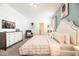 Charming bedroom with a bed and decorative dresser that enhances the home's appeal at 9036 Stinger E Dr, Davenport, FL 33896