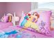 bedroom featuring a princess-themed bedding set on a cozy bed at 9036 Stinger E Dr, Davenport, FL 33896