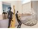 Unique Jazz-themed decor adding a touch of elegance to the modern interior space at 9036 Stinger E Dr, Davenport, FL 33896