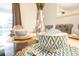 Elegant table setting featuring patterned bowls and plates for a dining room at 9036 Stinger E Dr, Davenport, FL 33896