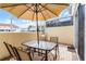Enclosed patio featuring a dining table and chairs for outdoor entertaining at 1149 S Beach Cir, Kissimmee, FL 34746