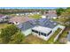 Aerial view of the home featuring solar panels on the roof at 1167 Saint Tropez Ct, Kissimmee, FL 34759