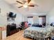 Bedroom with ceiling fan, and wood flooring at 1167 Saint Tropez Ct, Kissimmee, FL 34759