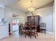Formal dining area features a wooden table and a china cabinet at 1167 Saint Tropez Ct, Kissimmee, FL 34759