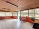 This cozy Florida room offers natural light and lots of space at 1167 Saint Tropez Ct, Kissimmee, FL 34759