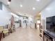 Expansive kitchen with white cabinets, a large island, and stainless steel appliances at 1167 Saint Tropez Ct, Kissimmee, FL 34759