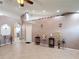 Spacious living area with ceramic tile flooring and tasteful decor; ideal for entertaining at 1167 Saint Tropez Ct, Kissimmee, FL 34759