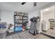 Spacious storage room with ample shelving, laundry access, and a treadmill at 1226 Pine St, Orlando, FL 32824