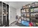 Organized storage room with shelving units provides ample space for containers and household items at 1226 Pine St, Orlando, FL 32824