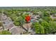 Aerial view of a house with trees in a residential neighborhood setting at 1345 Tindaro Dr, Apopka, FL 32703
