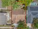 Aerial view of a home showcasing the backyard, neighboring properties, and roof at 1345 Tindaro Dr, Apopka, FL 32703