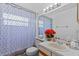 Well-lit bathroom with neutral tones, offering essential fixtures and functional design at 1345 Tindaro Dr, Apopka, FL 32703