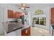 Bright kitchen with stainless appliances and cozy breakfast nook with lots of light at 1345 Tindaro Dr, Apopka, FL 32703