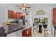 Cozy kitchen featuring stainless steel appliances and a sunlit breakfast nook at 1345 Tindaro Dr, Apopka, FL 32703