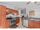Efficient kitchen with stainless appliances and ample cabinet space at 1345 Tindaro Dr, Apopka, FL 32703