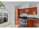 Kitchen with stainless appliances and a view of the outside at 1345 Tindaro Dr, Apopka, FL 32703