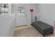 Mud room with exterior door, a comfortable bench, and storage shelving at 1345 Tindaro Dr, Apopka, FL 32703