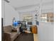 Bright office space featuring modern computer setup, filing cabinet, and comfortable chair at 1345 Tindaro Dr, Apopka, FL 32703