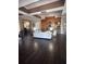 Inviting living room with fireplace, dark wood floors, and comfortable seating providing the perfect relaxation space at 14341 Fredricksburg Dr # 1016, Orlando, FL 32837