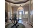 Bright and inviting lobby entrance with ample natural light and elegant architectural details, including decorative columns at 14341 Fredricksburg Dr # 1016, Orlando, FL 32837