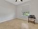 Neutral bedroom with a window offering natural light and a ceiling fan overhead at 164 Montoro Ln, Davenport, FL 33837