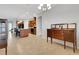 Open concept dining room with a cabinet and view of the kitchen at 164 Montoro Ln, Davenport, FL 33837