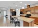 Modern kitchen featuring granite countertops, stainless steel appliances, and ample cabinet space at 164 Montoro Ln, Davenport, FL 33837