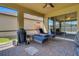 Relaxing lanai featuring chaise lounges, perfect for enjoying the outdoor view and sunshine at 164 Montoro Ln, Davenport, FL 33837