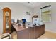 Well-equipped home office with a large desk, providing ample workspace for productivity at 164 Montoro Ln, Davenport, FL 33837