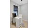 Bright office space featuring a white desk and chair, providing a clean and modern workspace at 164 Montoro Ln, Davenport, FL 33837