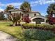 Lancaster Parke East Amenity Center with beautifully landscaped entrance and well-maintained building on a sunny day at 1654 Chatsworth Cir, St Cloud, FL 34771