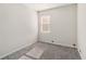 Neutral bedroom with gray carpet and a window at 1654 Chatsworth Cir, St Cloud, FL 34771