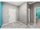 The neutral entryway leads to other rooms in this home at 1654 Chatsworth Cir, St Cloud, FL 34771