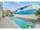 Relax in this screened-in pool area, complete with a tropical mural and comfortable lounge chairs at 1923 Lazy Oaks Loop, St Cloud, FL 34771