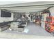 Spacious garage featuring stylish decor, seating area, and custom storage solutions at 2015 Barstow Ln, Dundee, FL 33838