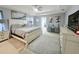 Bright and spacious main bedroom with elegant decor and plenty of natural light at 2015 Barstow Ln, Dundee, FL 33838
