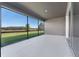 A screened-in patio with great views of the fenced in backyard at 2017 Camden Loop, Davenport, FL 33837