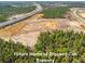 Future home of Crooked Can Brewery, surrounded by trees and highways at 2238 Gold Dust Dr, Clermont, FL 34715