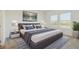 Serene bedroom with a plush bed, soft lighting, and modern decor at 2238 Gold Dust Dr, Clermont, FL 34715
