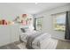 Bright, -friendly bedroom with whimsical decor and a playful atmosphere at 2238 Gold Dust Dr, Clermont, FL 34715