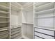 Organized walk-in closet with ample shelving, drawers, and storage solutions at 2238 Gold Dust Dr, Clermont, FL 34715