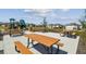 Outdoor picnic area with picnic tables and a playground at 2238 Gold Dust Dr, Clermont, FL 34715