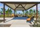 Covered picnic area with benches looking onto playground and grassy area at 2238 Gold Dust Dr, Clermont, FL 34715