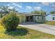 Charming single story home with a driveway and carport at 224 Pennsylvania Ave, St Cloud, FL 34769