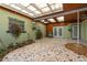Spacious sunroom featuring a unique mosaic tile floor, skylights and a ceiling fan at 224 Pennsylvania Ave, St Cloud, FL 34769