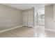 Bedroom featuring tile flooring with closet and attached bathroom at 2305 St Marteen Ct # 2305, Kissimmee, FL 34741