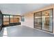 Enclosed patio area with sliding glass doors, creating a comfortable outdoor living space at 2305 St Marteen Ct # 2305, Kissimmee, FL 34741